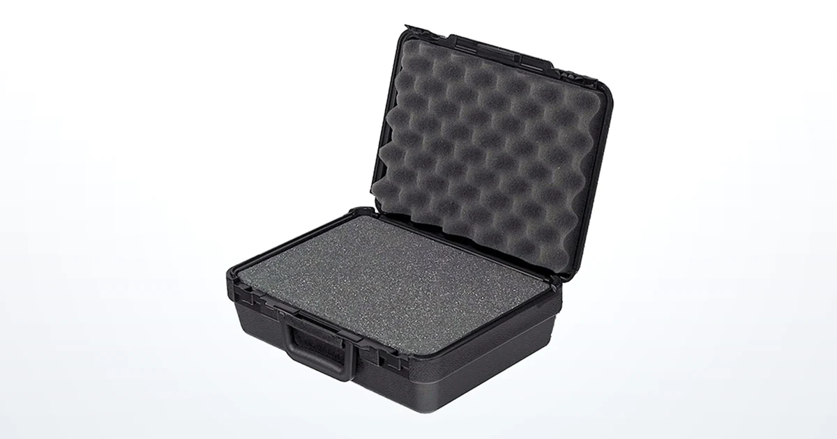 An open Blow Molded carrying case fitted with convoluted foam in the base and lid