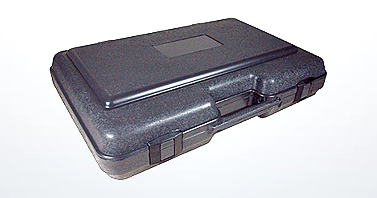 A closed carrying case showing the blank recessed cavity plate molded into the lid, where a logo is applied